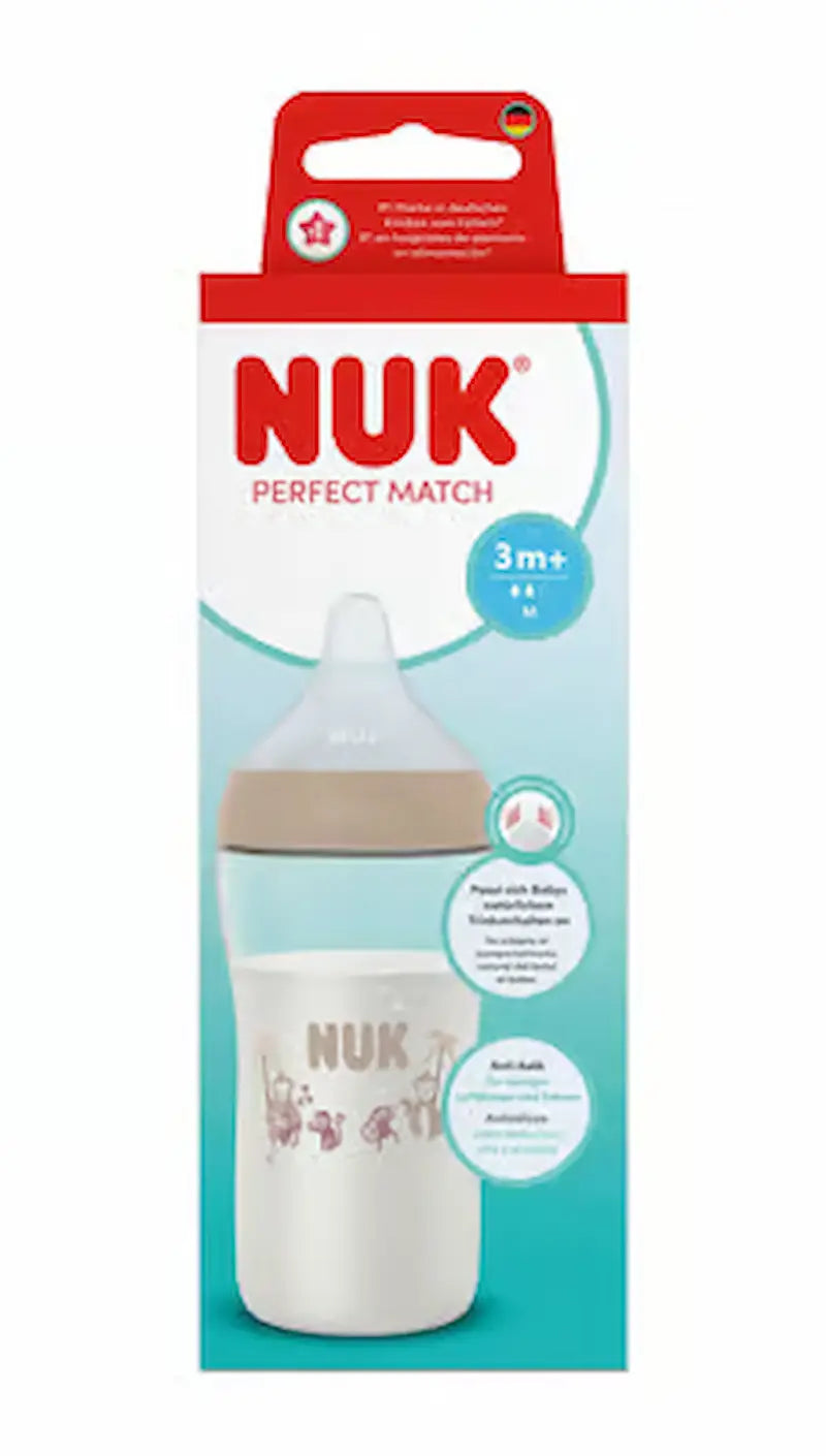 Biberon NUK Perfect Match 260ml 3m+ beige avec tétine souple en silicone et motifs singes anti-colique.
