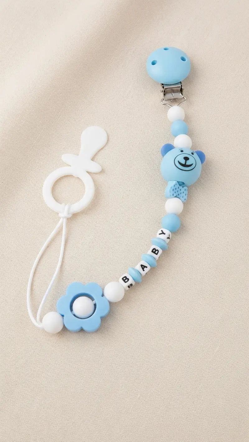 Attache-sucette en silicone motif ours JM Baby pour bébé.