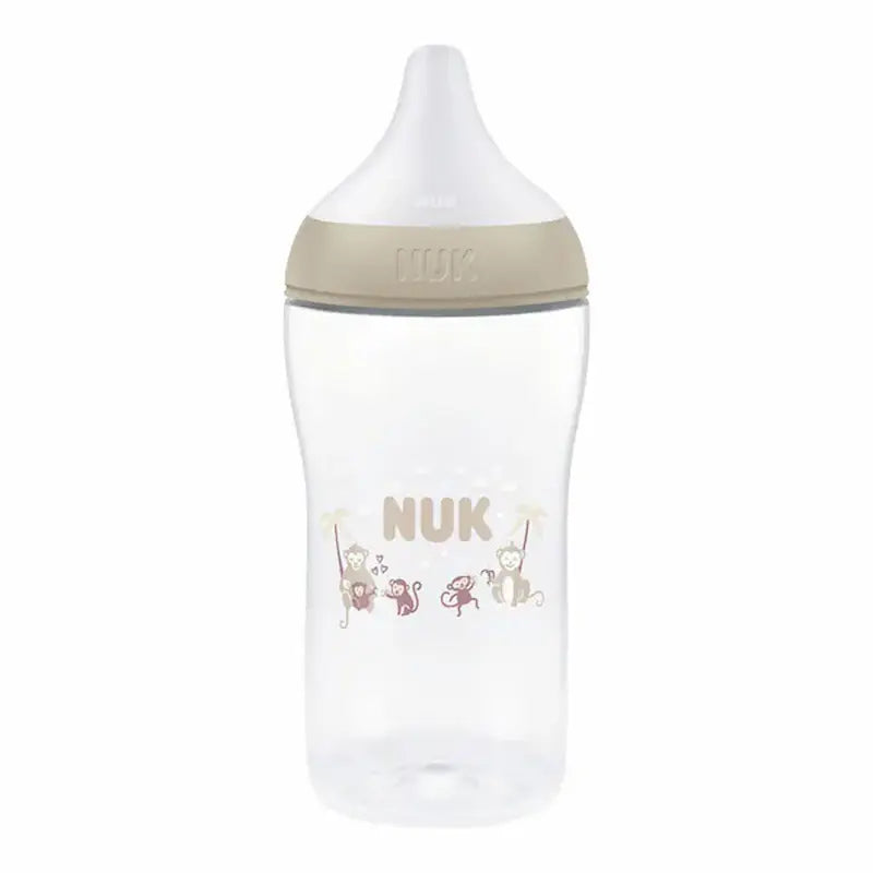 Biberon NUK Perfect Match 6m+ anti-colique avec tétine souple XL et motifs singes.