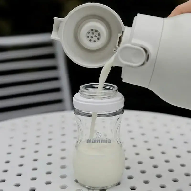 Chauffe biberon portable intelligent Mammia blanc avec affichage numérique de la température.